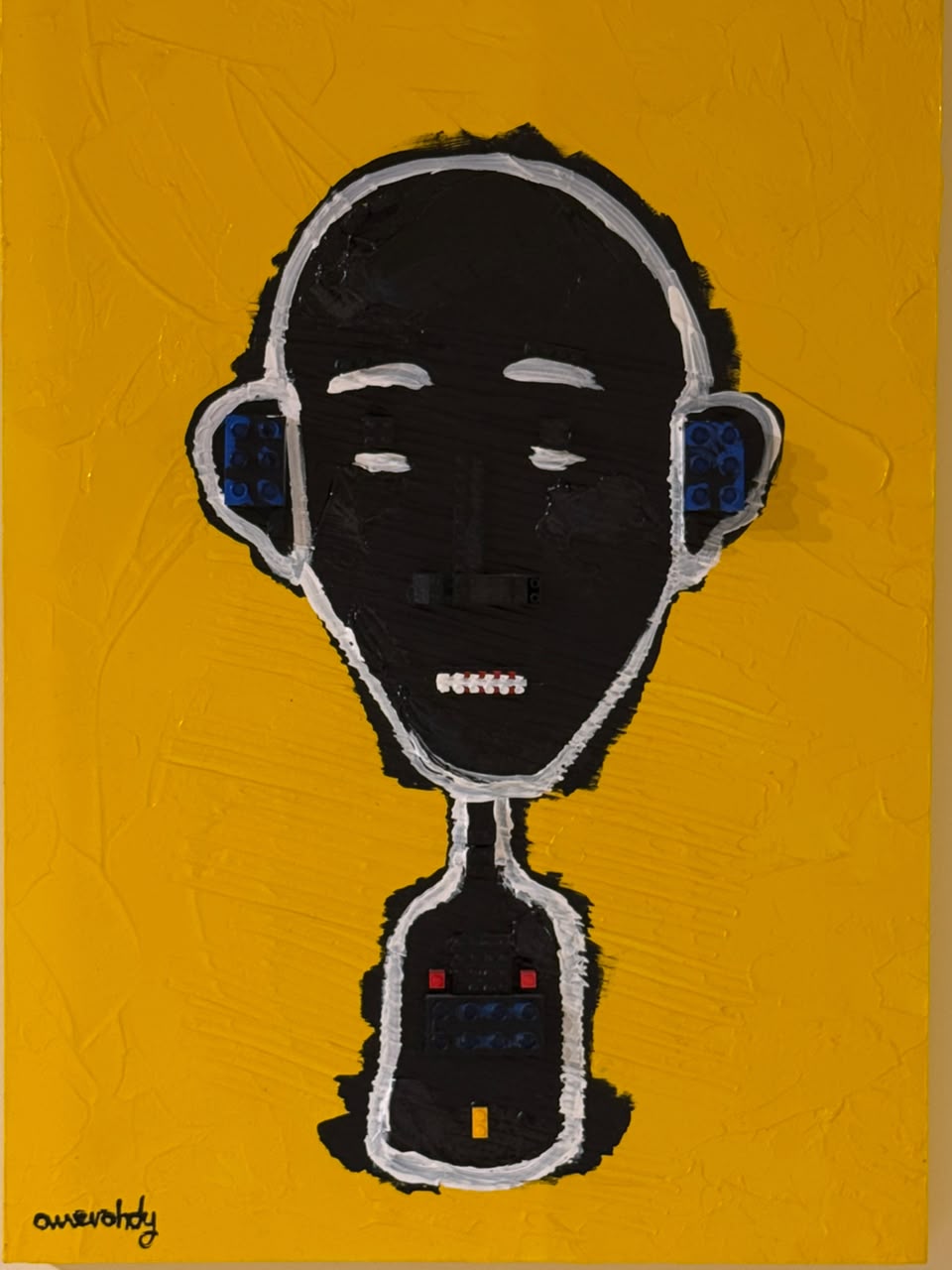 black face on yellow